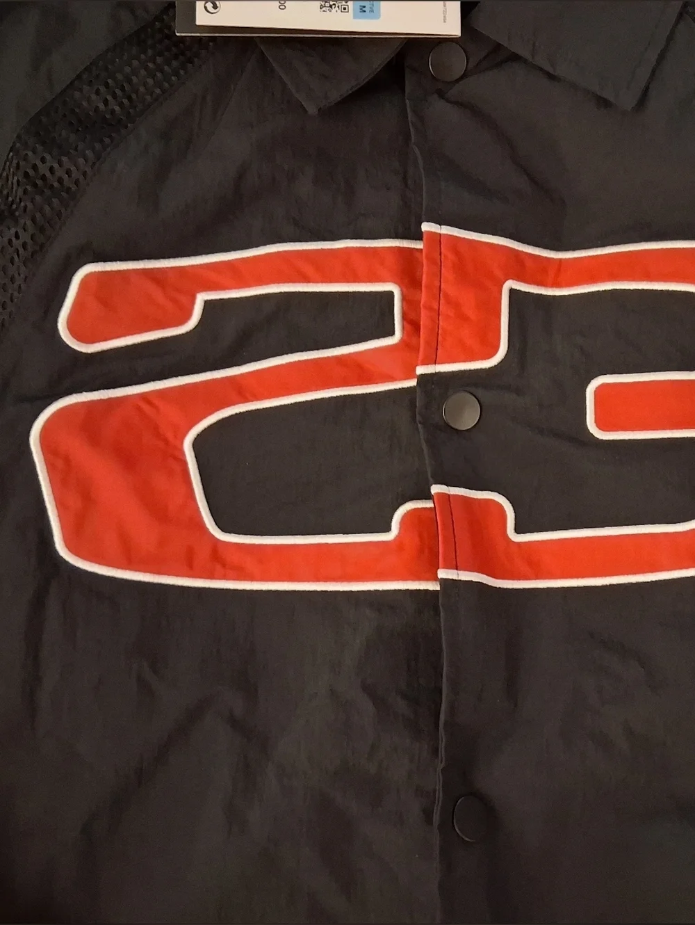 Jordan Men’s Black Windbreaker with Red 23 Patch
